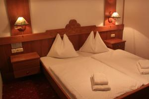 Voodi või voodid majutusasutuse Hotel Lindwurm toas
