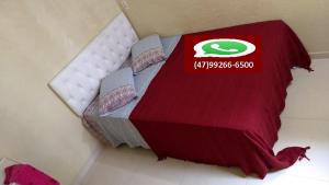Tempat tidur dalam kamar di Hostel Fariafaz