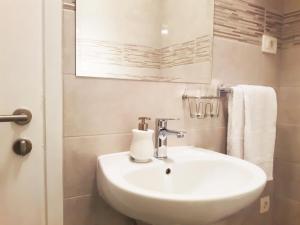 Kúpeľňa v ubytovaní Tajc Rooms + 23 fotografií