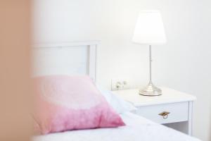 Posteľ alebo postele v izbe v ubytovaní Guest House Simoni