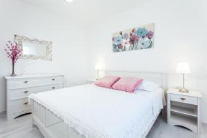 Posteľ alebo postele v izbe v ubytovaní Guest House Simoni