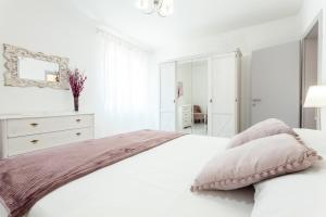 Posteľ alebo postele v izbe v ubytovaní Guest House Simoni