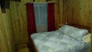 Postel nebo postele na pokoji v ubytování Hospedaje Los Calafates