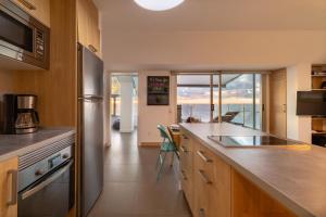A kitchen or kitchenette at Living Las Canteras - BEACHFRONT ROOF TOP TERRACE