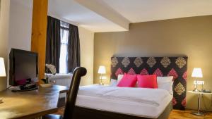 Postel nebo postele na pokoji v ubytování Hotel Engel