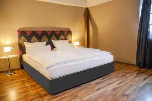 Postel nebo postele na pokoji v ubytování Hotel Engel