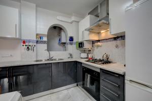 Køkken eller tekøkken på Victoria Apartment + 19 billeder