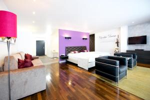 Ein Bett oder Betten in einem Zimmer der Unterkunft Alpenlove - Adult SPA Hotel