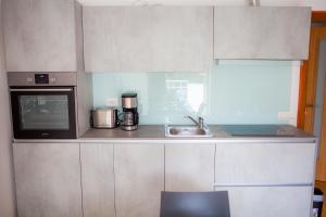 Kuchyňa alebo kuchynka v ubytovaní Apartment Lunta 2