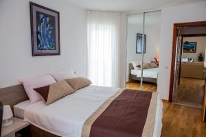 Posteľ alebo postele v izbe v ubytovaní Apartment Lunta 2