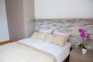 Posteľ alebo postele v izbe v ubytovaní Apartment Lunta 2