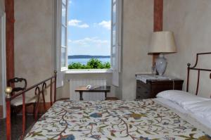 Postel nebo postele na pokoji v ubytování Casa Martelli + 208 fotografií