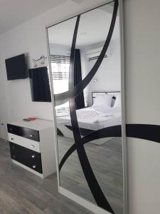 Postel nebo postele na pokoji v ubytování Guest House Evtimov