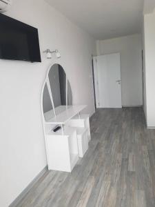 TV a/nebo společenská místnost v ubytování Guest House Evtimov