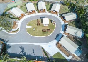 an overhead view of a road with white trailers at Shoal Bay Holiday Park in Shoal Bay
