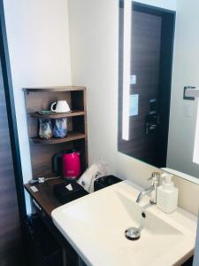 Koupelna v ubytování Hotel Emit Ueno