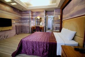 Postel nebo postele na pokoji v ubytování Spring City Motel