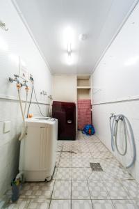 Ένα μπάνιο στο Funstay Inn Guesthouse +51 φωτογραφίες