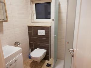 Koupelna v ubytování Apartmani Karla