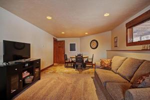 a living room with a couch and a table at Casa de Plata Home in Breckenridge