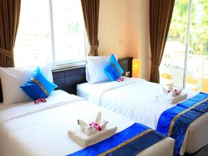 Postel nebo postele na pokoji v ubytování 88 Hotel + 36 fotografií