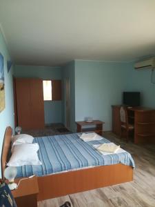 Postel nebo postele na pokoji v ubytování Casa Dalena