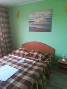 Postel nebo postele na pokoji v ubytování Casa Dalena