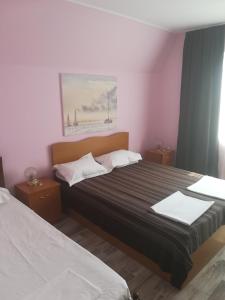 Postel nebo postele na pokoji v ubytování Casa Dalena