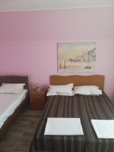 Postel nebo postele na pokoji v ubytování Casa Dalena