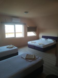 Postel nebo postele na pokoji v ubytování Casa Dalena