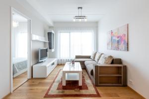 Posezení v ubytování Cosy city apartment