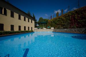 Bazén v ubytování Hotel San Lino nebo v jeho okolí
