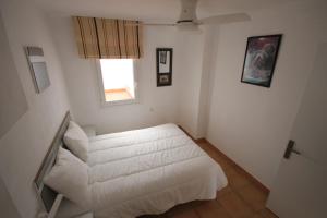 Posteľ alebo postele v izbe v ubytovaní Duplex Fray Junipero