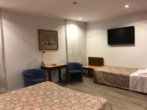 TV a/nebo společenská místnost v ubytování Hotel San Giorgio