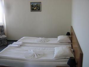 Krevet ili kreveti u jedinici u okviru objekta Family Hotel ATLAS