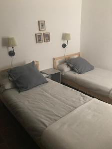 Postel nebo postele na pokoji v ubytování Apartamento Completo Santa Marina