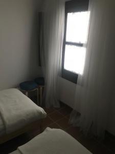 Postel nebo postele na pokoji v ubytování Apartamento Completo Santa Marina