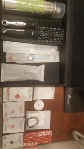 a drawer with some items in a box at Hotel Louis in Busan