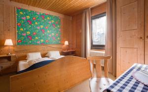 Postel nebo postele na pokoji v ubytování WildeGams Gasthof und Brauerei