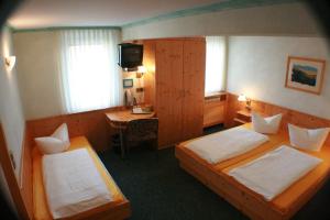 Katil atau katil-katil dalam bilik di Hotel Rebstock