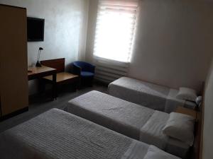 Postel nebo postele na pokoji v ubytování Hotel San Giorgio
