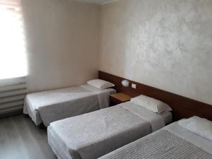 Postel nebo postele na pokoji v ubytování Hotel San Giorgio