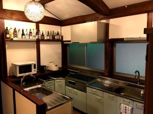 Kuchyň nebo kuchyňský kout v ubytování Guesthouse Wasabi