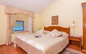 Postel nebo postele na pokoji v ubytování Hotel Ostrea