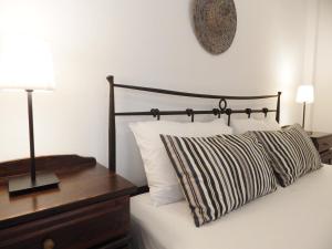 Ein Bett oder Betten in einem Zimmer der Unterkunft Hotel Pilalidis