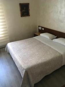 Postel nebo postele na pokoji v ubytování Hotel San Giorgio