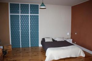Postel nebo postele na pokoji v ubytování Chambre d'hotes de Jacobiel