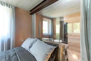 Postel nebo postele na pokoji v ubytování Tulipa Natural Home + 64 fotografií