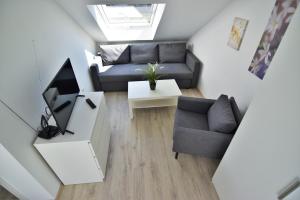 Exclusive Apartment Cologne tesisinde bir oturma alanı