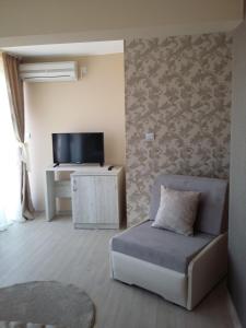 TV a/nebo společenská místnost v ubytování Guest House Adriya